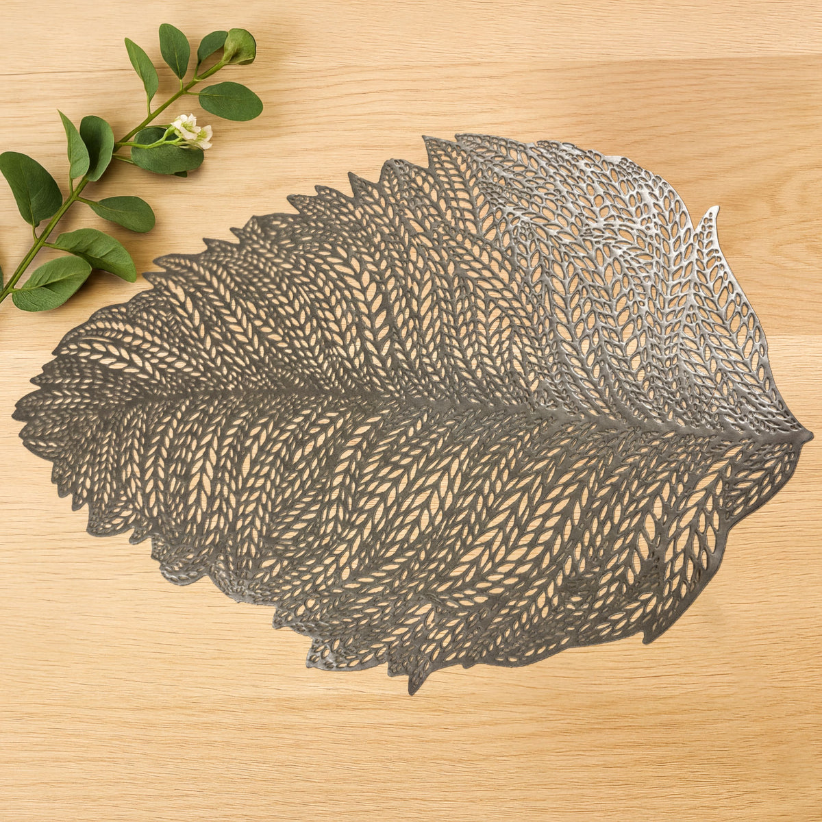 Set of six leaf cut out vinyl placemats by AMF033-GLD, decorative table placemats with intricate leaf designs.