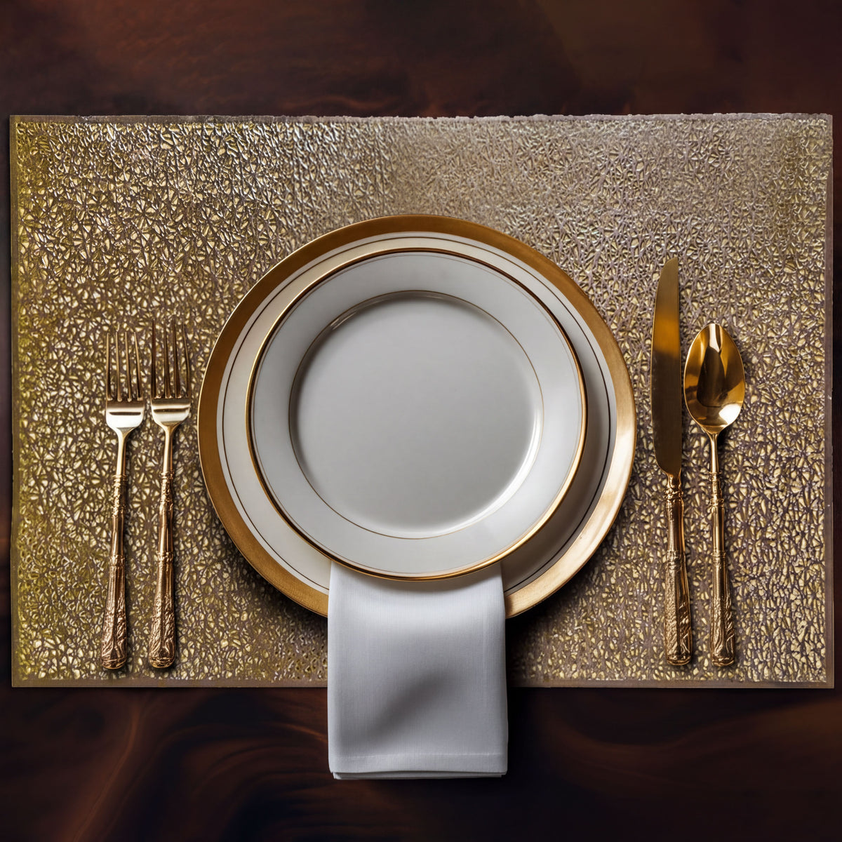 Set of six gold PVC cut-out placemats with intricate designs, perfect for protecting tables and adding style.