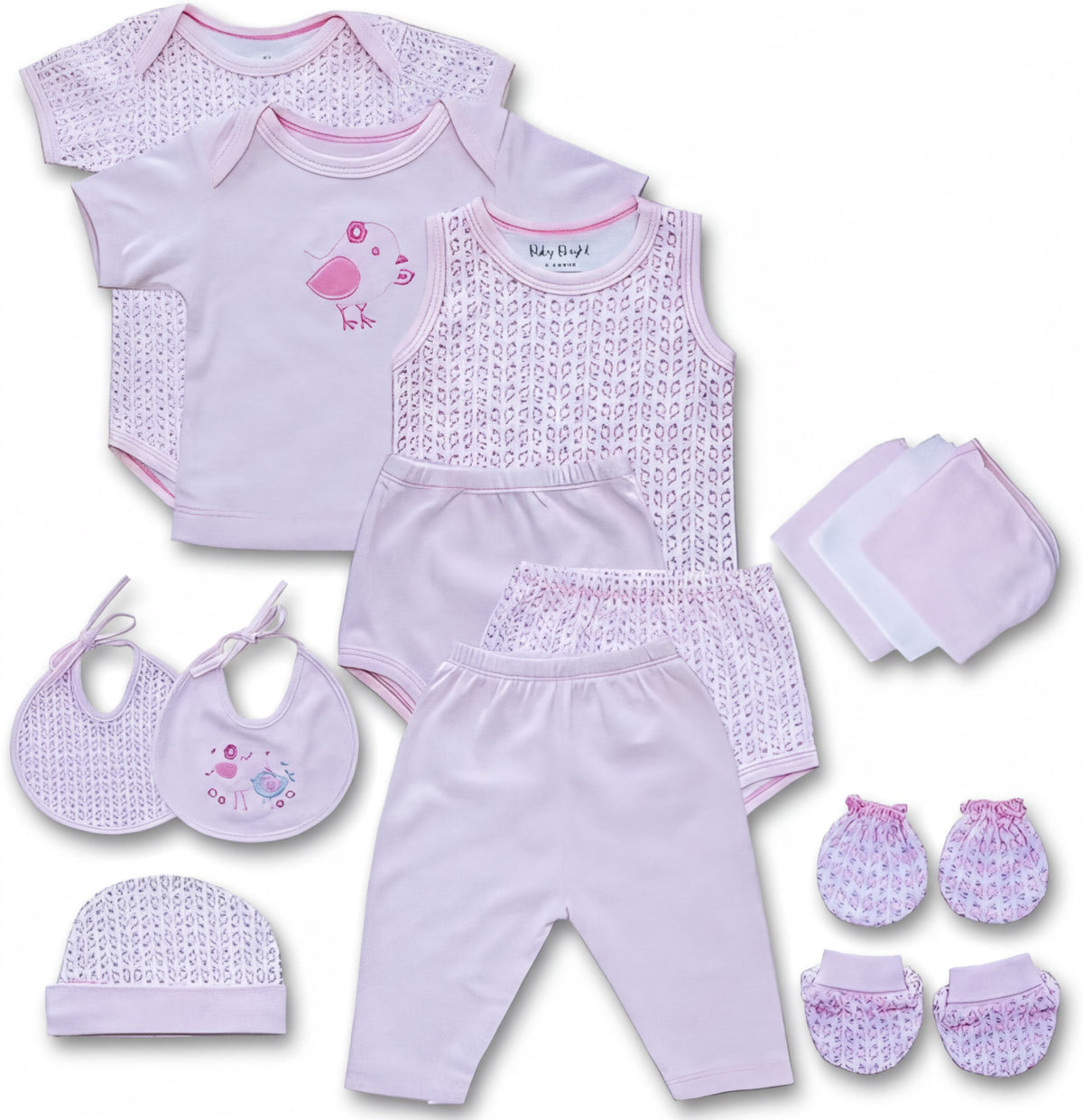 A collection of pink baby clothing and accessories, including onesies, bibs, hats, and mittens, arranged on a white background.