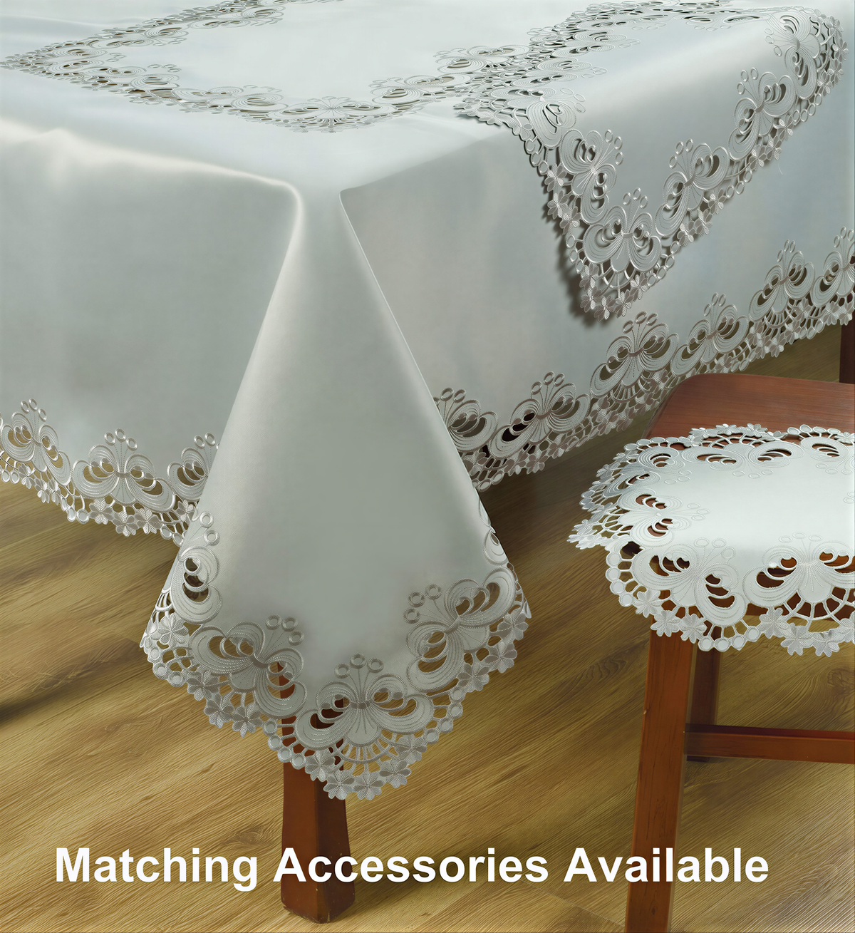 Set of six linen placemats with European embroidery from the Creola Collection, featuring intricate decorative details.