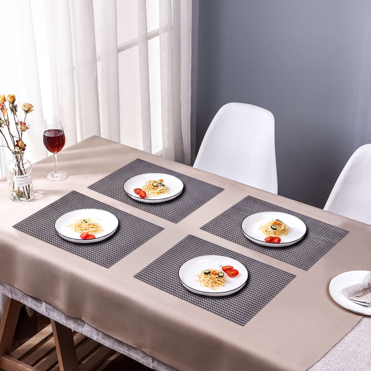 Set of four PVC placemats for dining table, durable and easy to clean, by brand 44334, perfect for protecting your tabletop during meals.