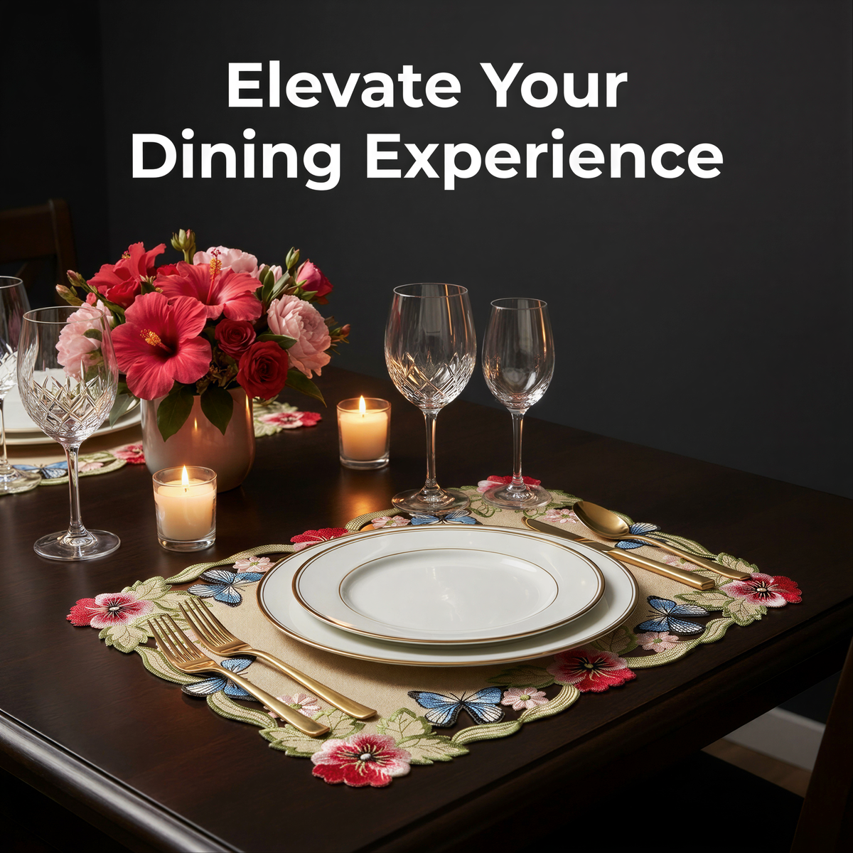 a table set for a meal, with a floral centerpiece, wine glasses, plates, and cutlery arranged neatly.