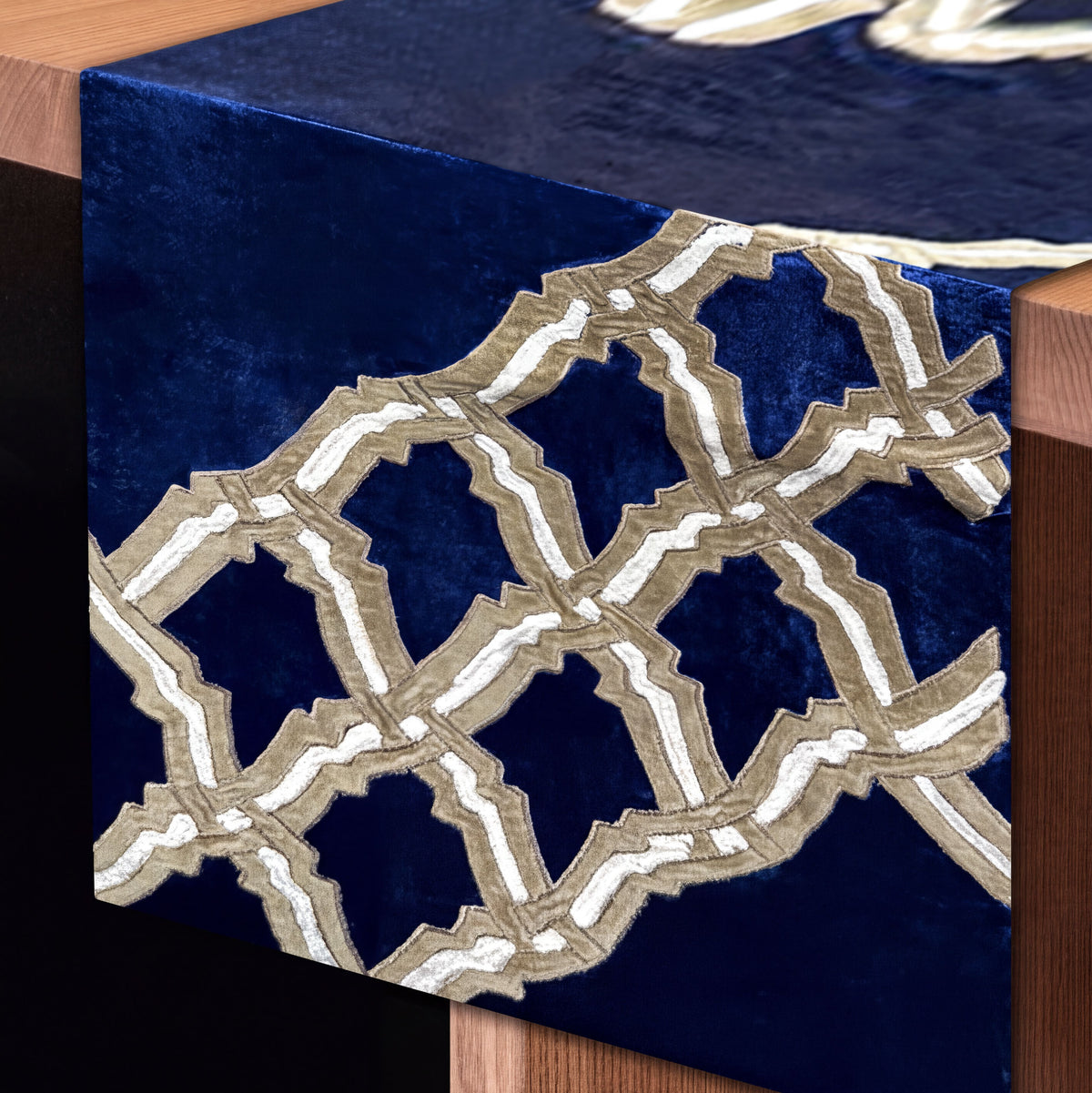Embroidered decorative table runner with intricate floral patterns, designed for elegant dining tables.