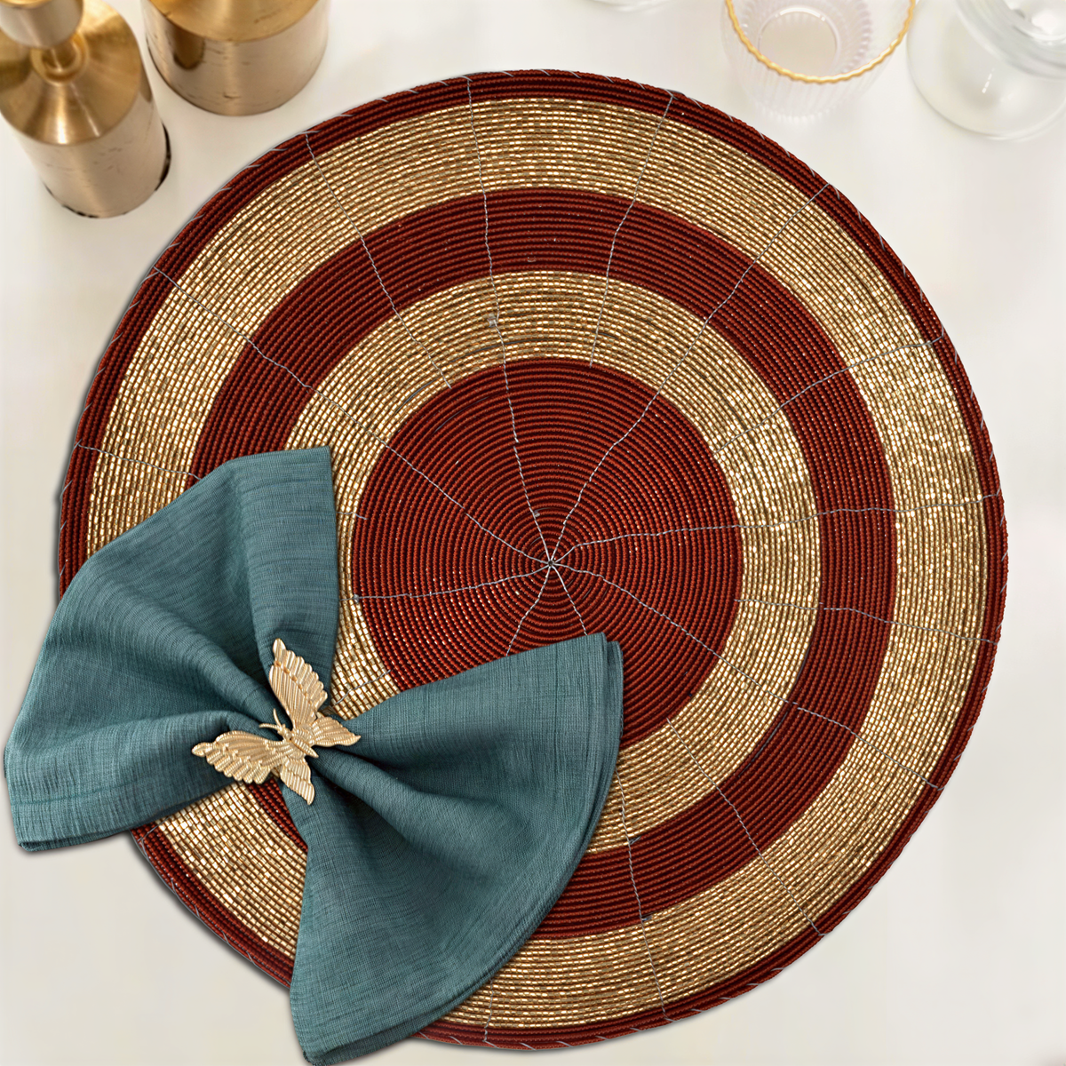 Set of four Decozen Aidden Bloom beaded placemats, 14-inch decorative table decor with intricate beaded design from The Aidden Collection.