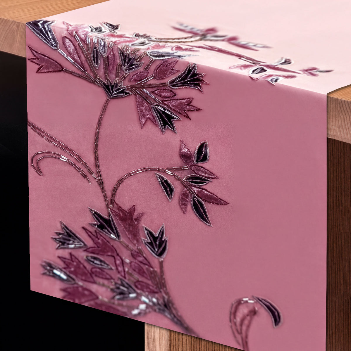 Embroidered decorative table runner with intricate floral patterns, designed for elegant dining table decor.