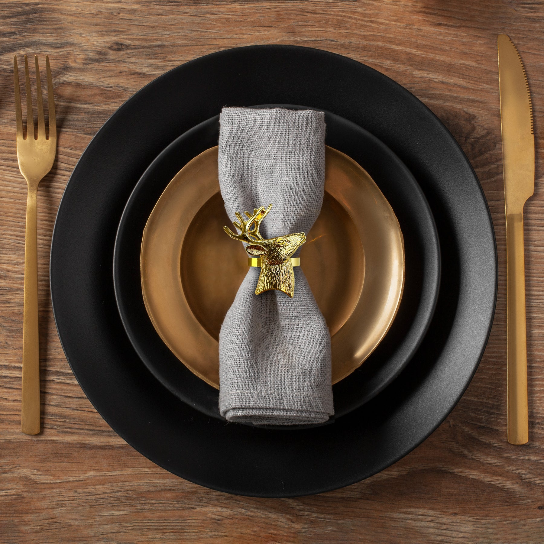 Napkin Rings in Gold Reindeer Design