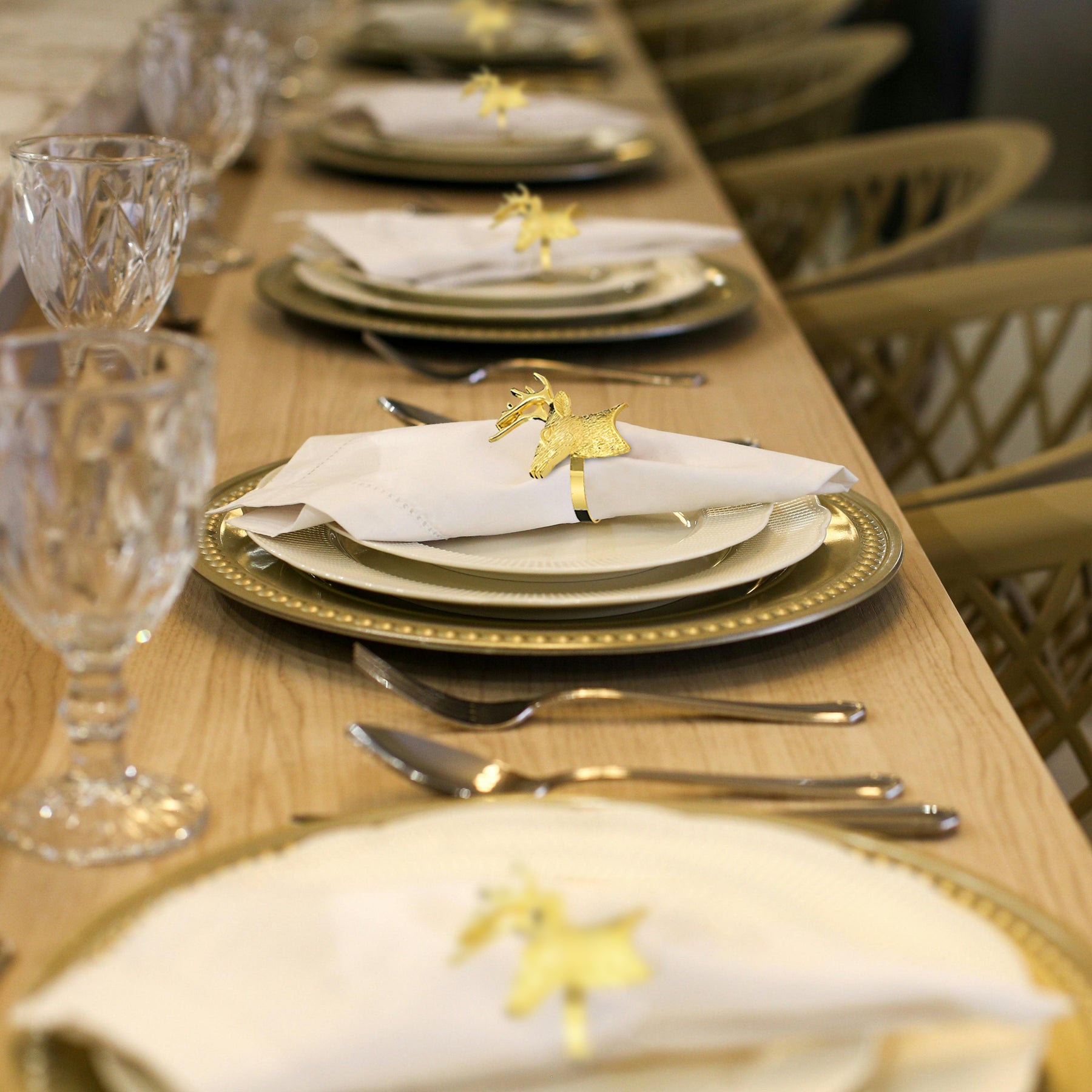 Napkin Rings in Gold Reindeer Design