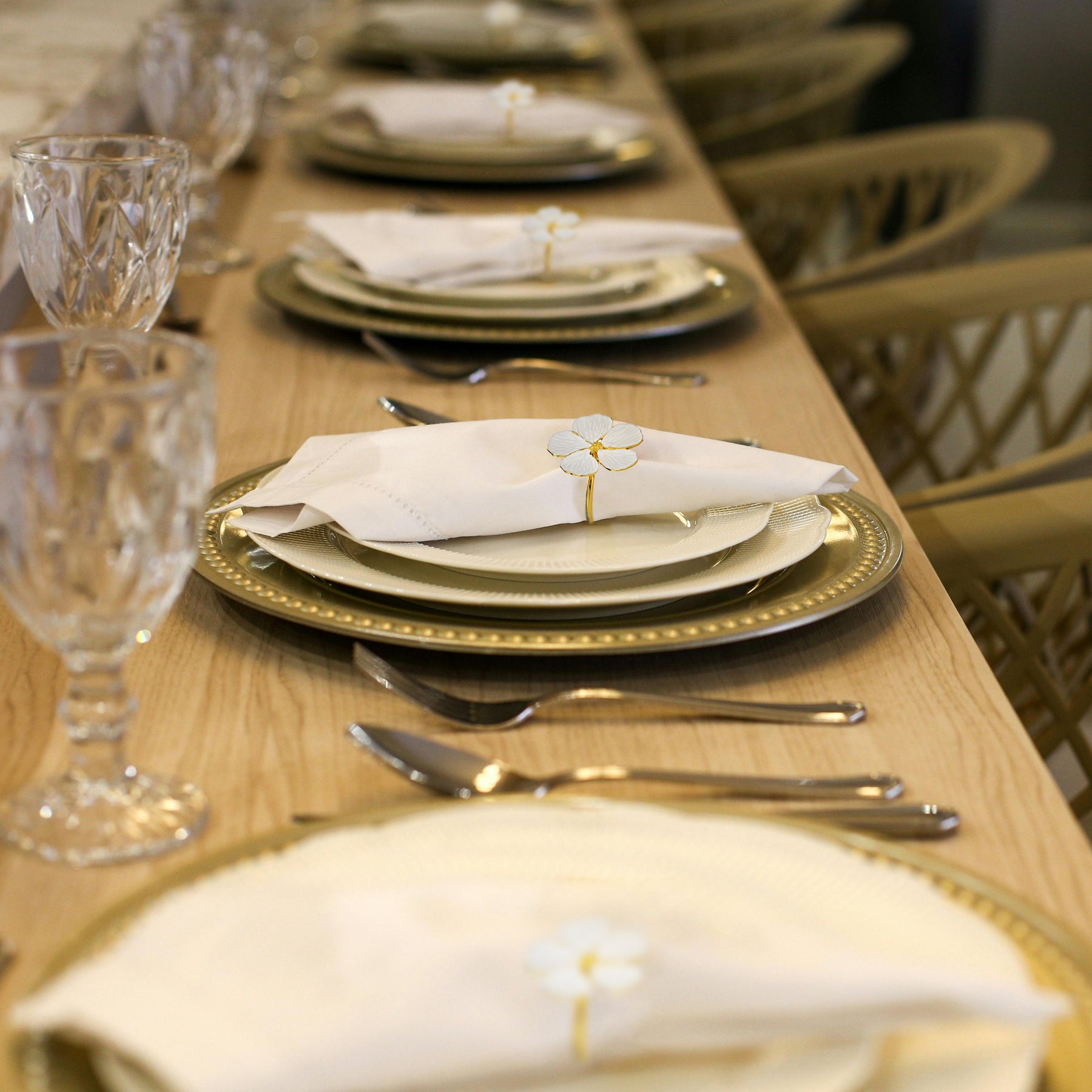 Napkin Rings in Gold White Flower Design