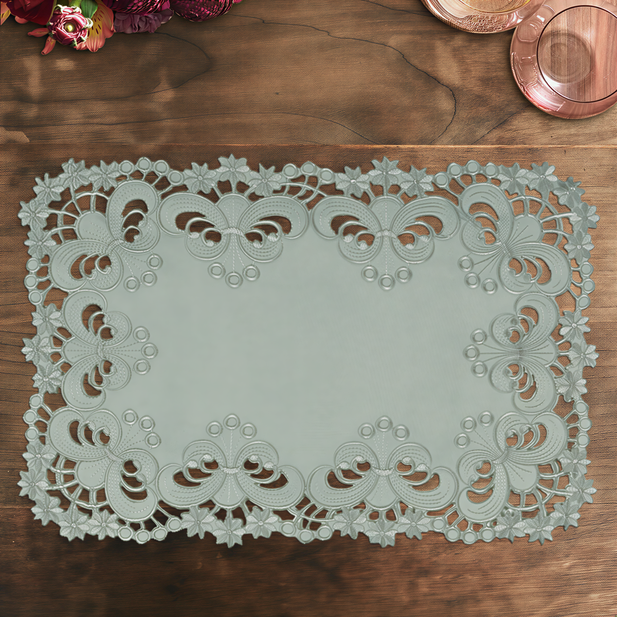 Set of six linen placemats with European embroidery from the Creola Collection, stylish and decorative table accessories.
