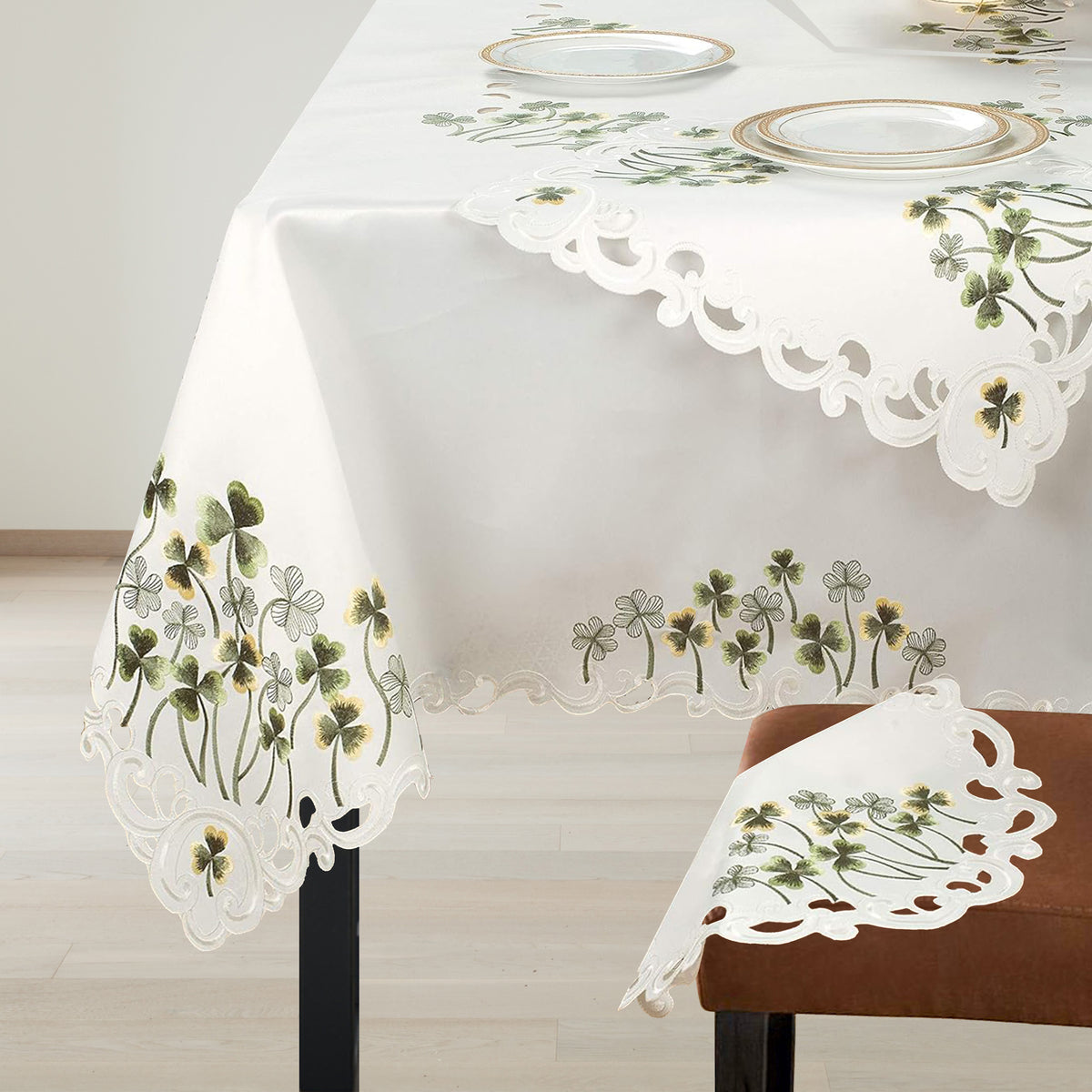 Elegant table covers from the Clem Collection with European embroidery, showcasing detailed craftsmanship and decorative design.