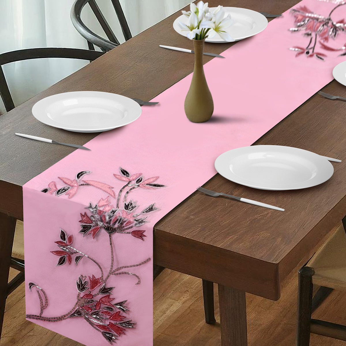 Embroidered decorative table runner with intricate floral patterns in neutral tones, designed for elegant dining tables.