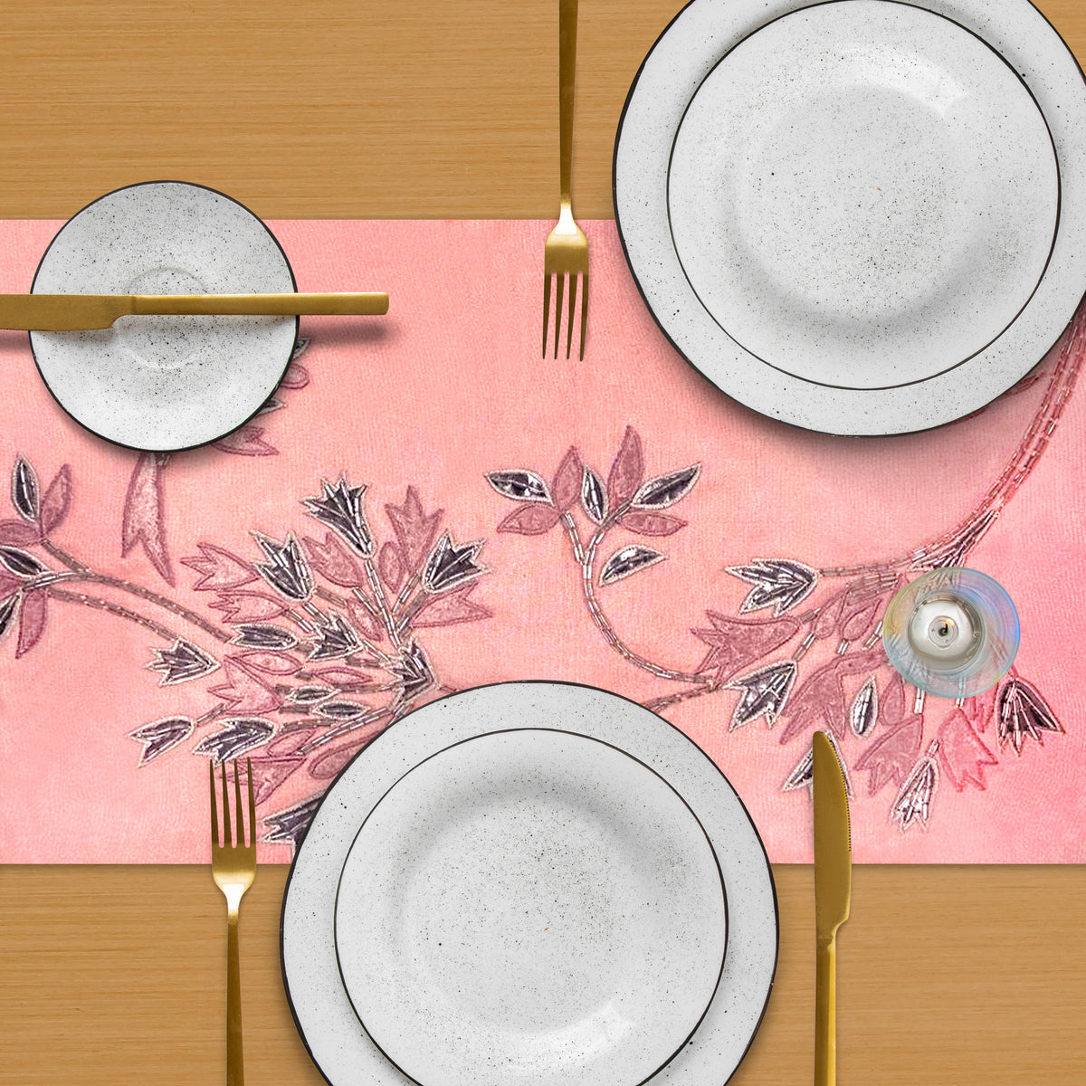 Embroidered decorative table runner with intricate floral design, made by CU6409-RNR, perfect for enhancing table decor.