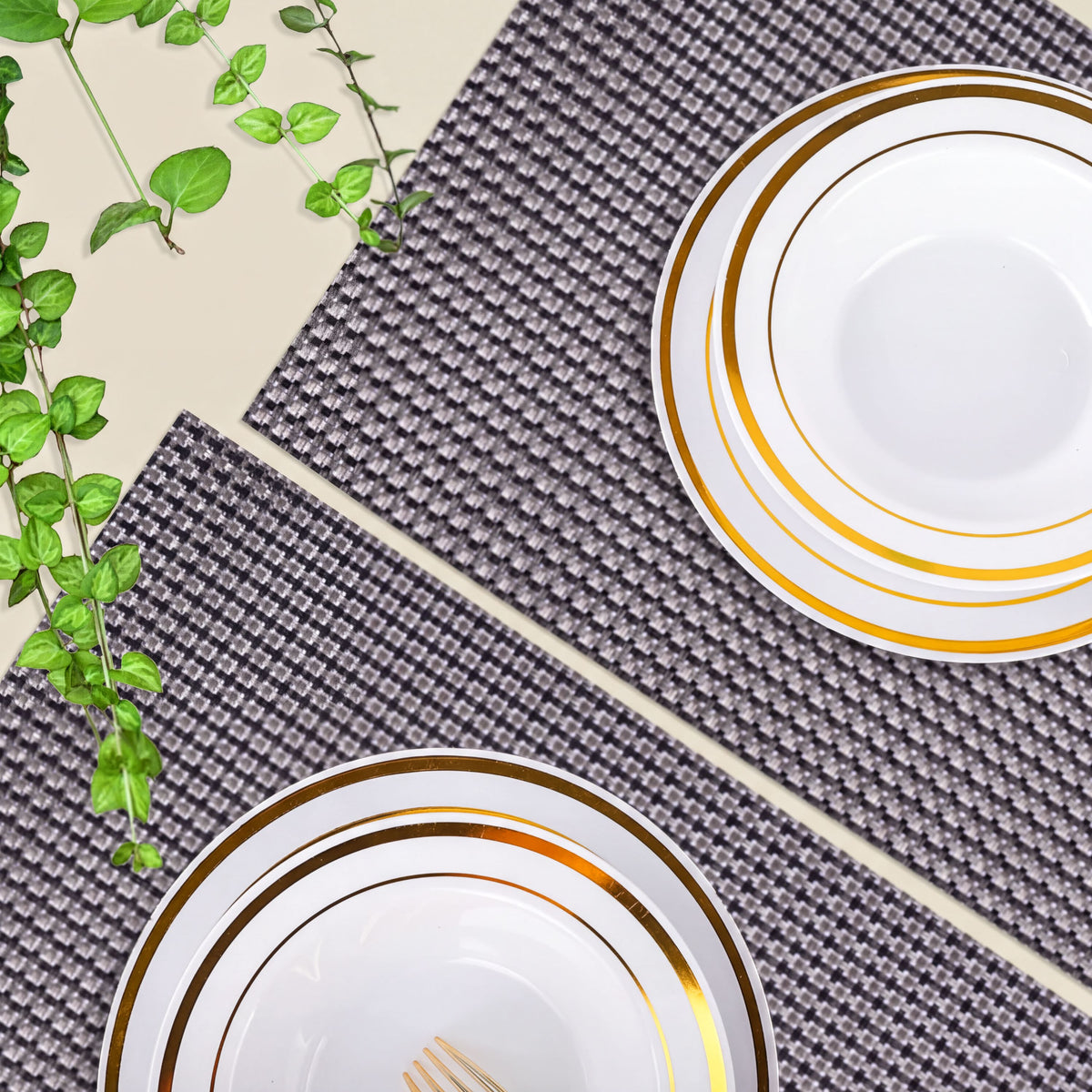Set of four PVC placemats for dining table by 44334, featuring durable, waterproof material with stylish design.