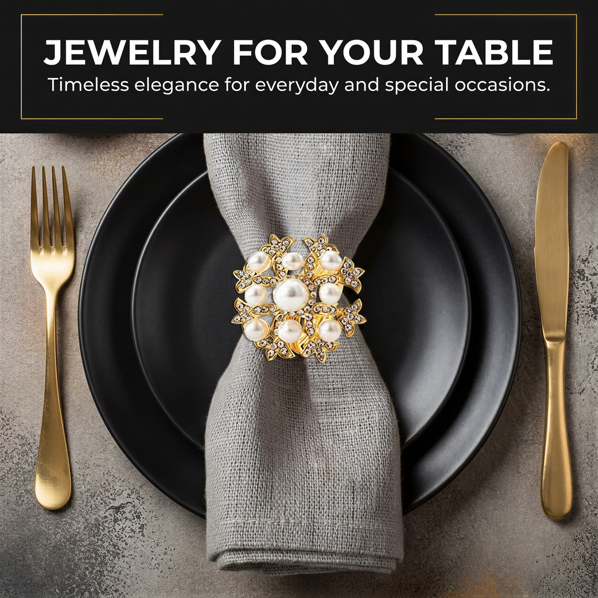 a table setting with a black plate, a gold-colored napkin ring, a gold fork, a gold knife, and a gold-colored bowl.