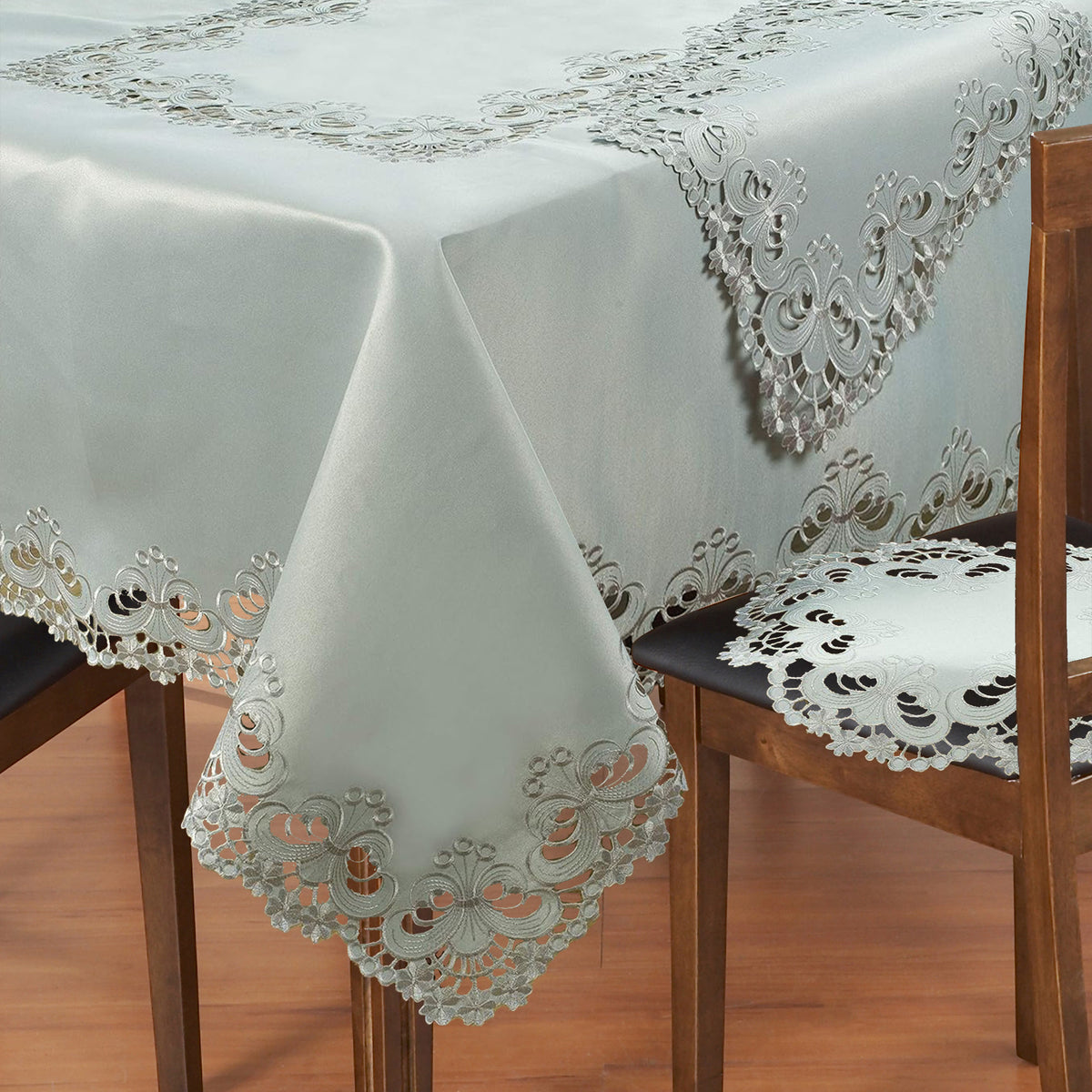 Elegant table cover from The Creola Collection with European embroidery, showcasing intricate design and high-quality craftsmanship.