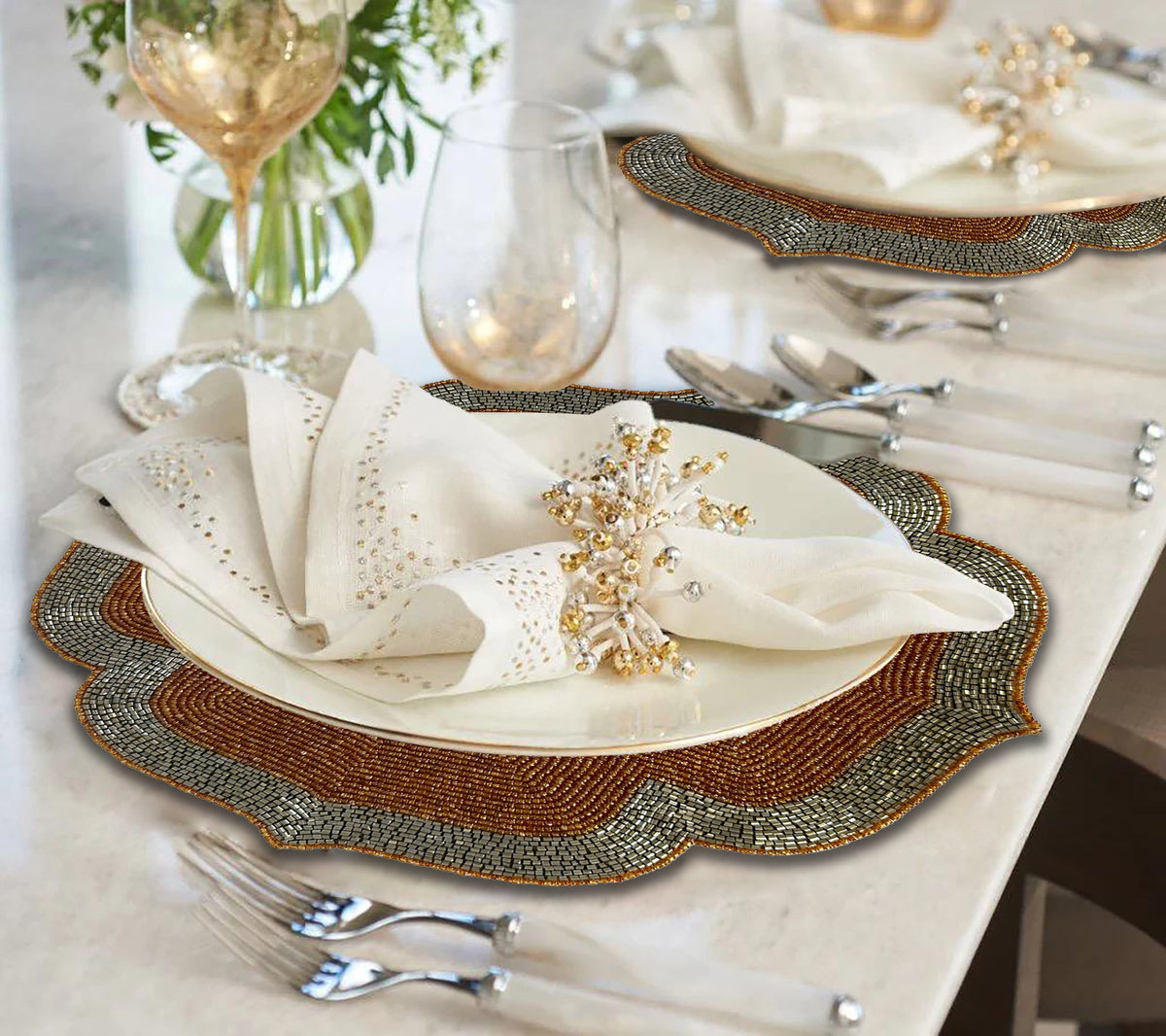 Set of two Sunset Frost embroidered beaded placemats in burnt orange and silver, 14-inch decorative dining table accents.