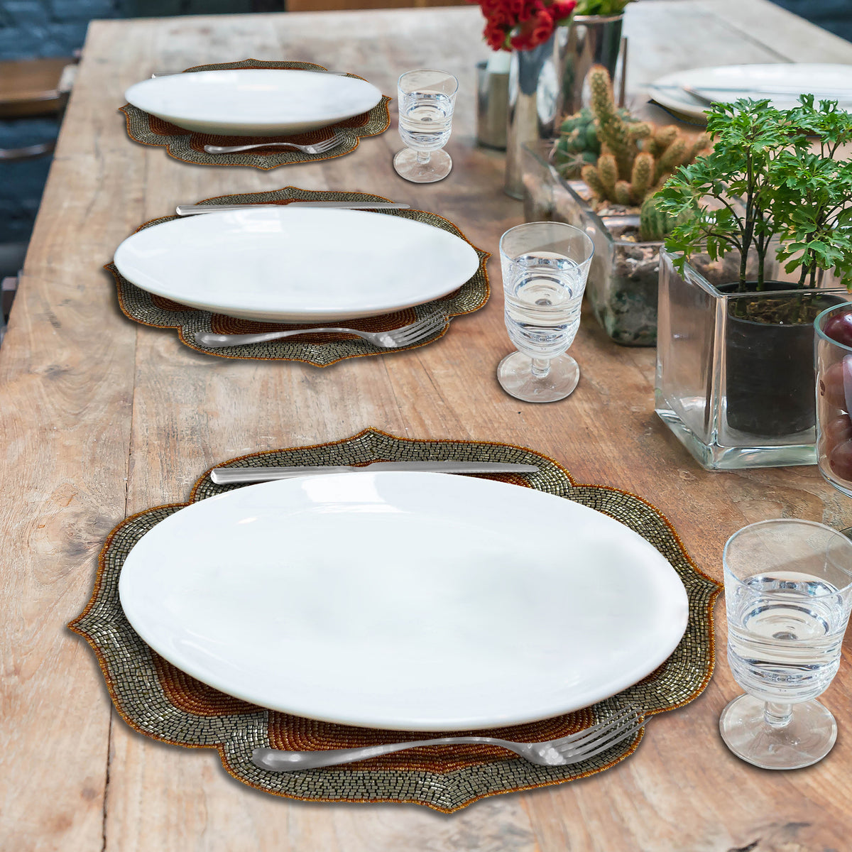 Set of two Sunset Frost beaded placemats in burnt orange and silver, embroidered decorative dining table accents, 14 inches.