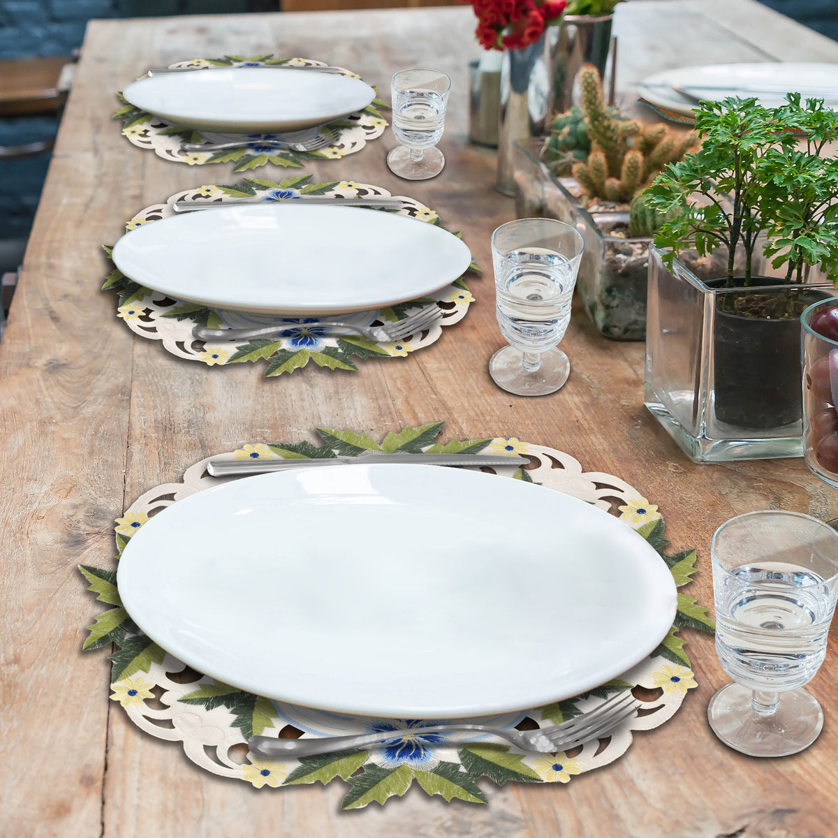Set of four round lace placemats in blue or green with white embroidery, 15-inch European design for dining and home decor.