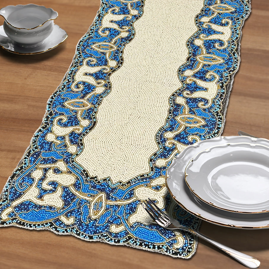 Beaded white and blue table runner, 54 inches by 13 inches, styled for elegant dining tables.