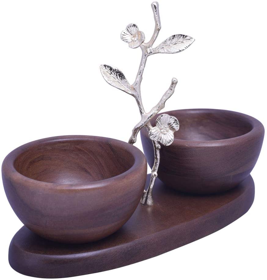 Two small acacia wood nut bowls for kitchen decor, showcasing smooth, natural wood grain and compact, functional design.