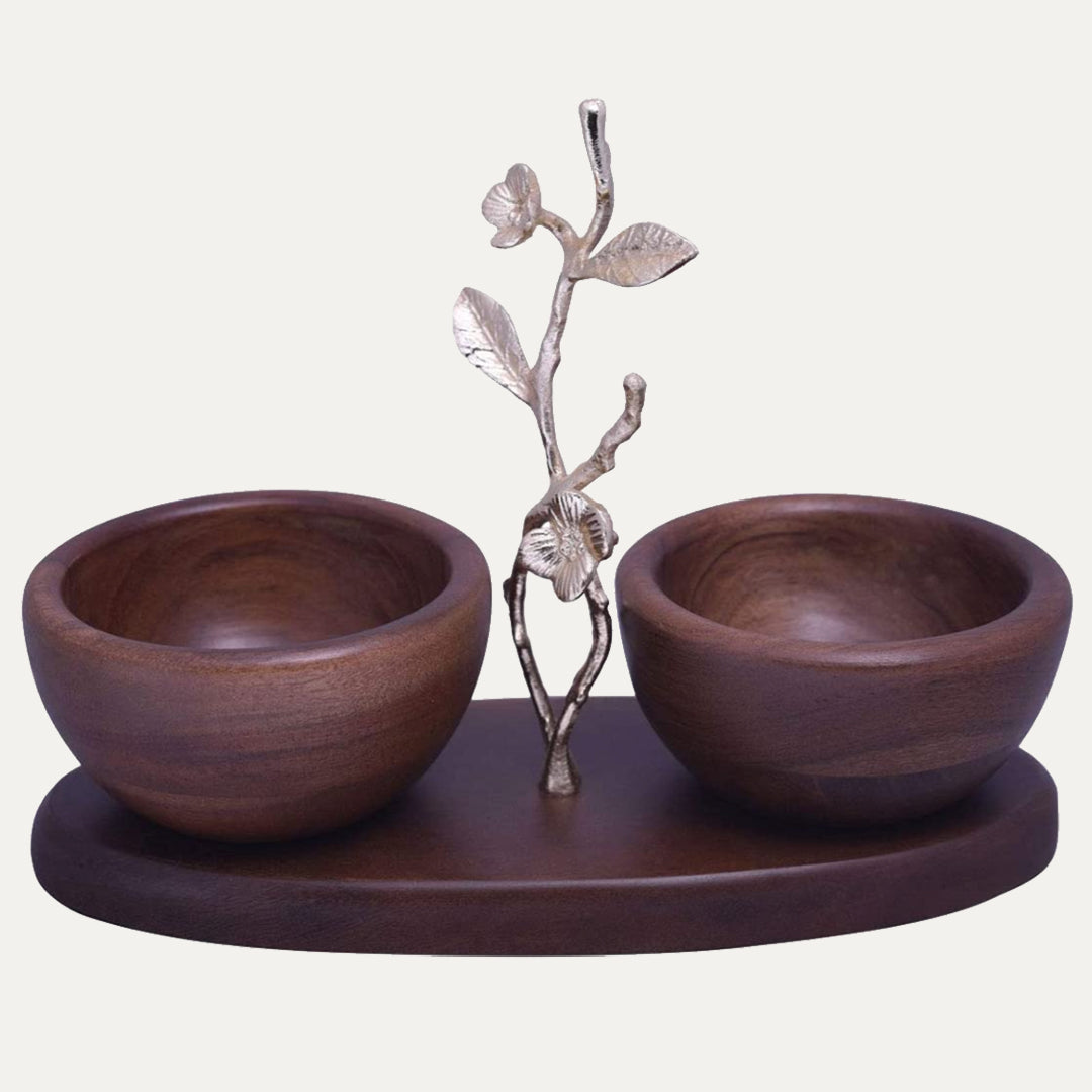 Two small acacia wood nut bowls for kitchen decor, featuring natural wood grain and a smooth, polished finish.