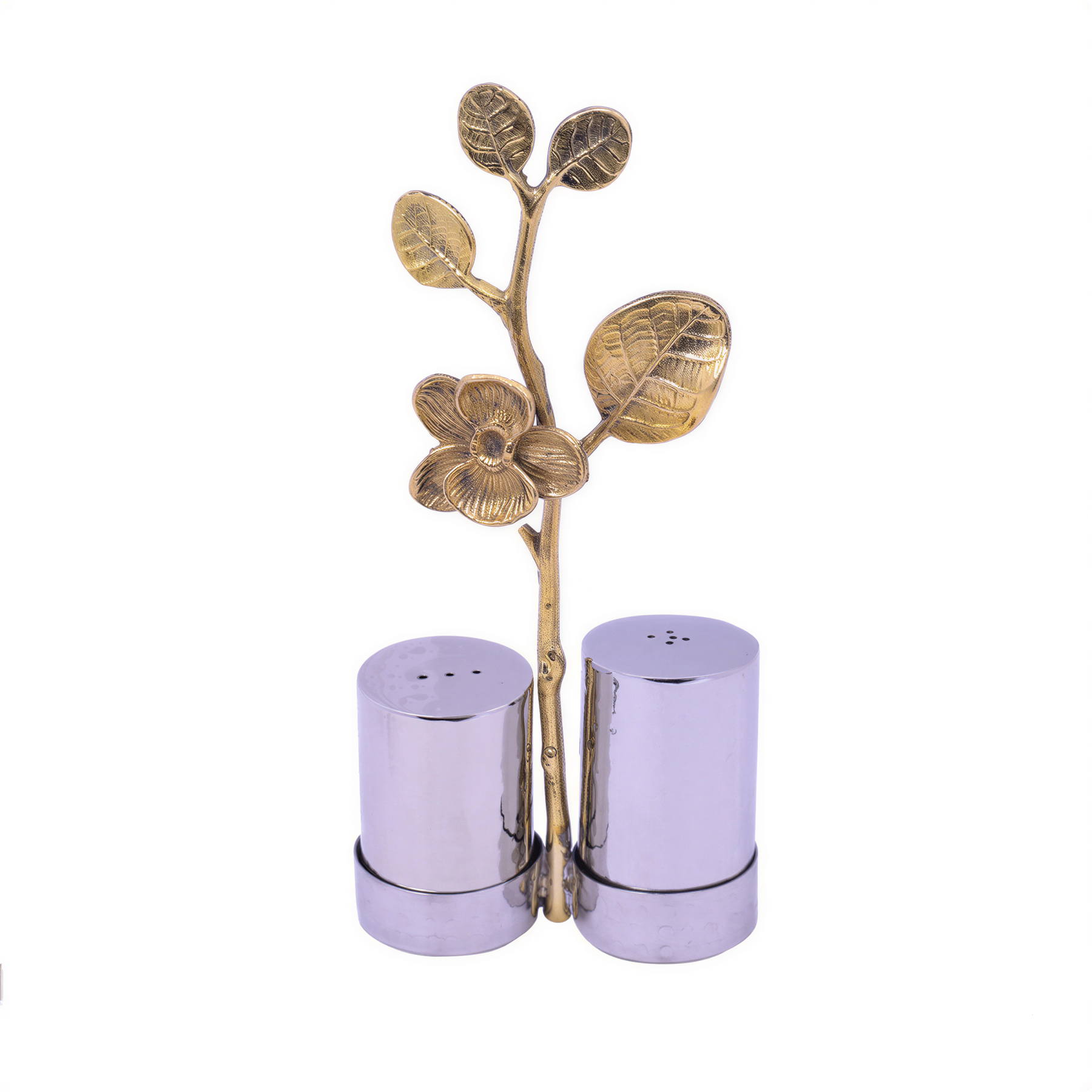 Salt and pepper shaker set in decorative kitchen décor, featuring stylish ceramic shakers with black and white design.