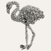 Set of four silver flamingo-shaped napkin rings from ZWZ-19-099 Tropical Charm collection, decorative dining table accents.