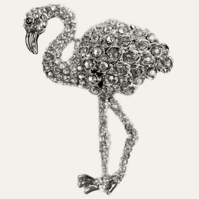 Set of four silver flamingo-shaped napkin rings from ZWZ-19-099 Tropical Charm collection, decorative dining table accents.