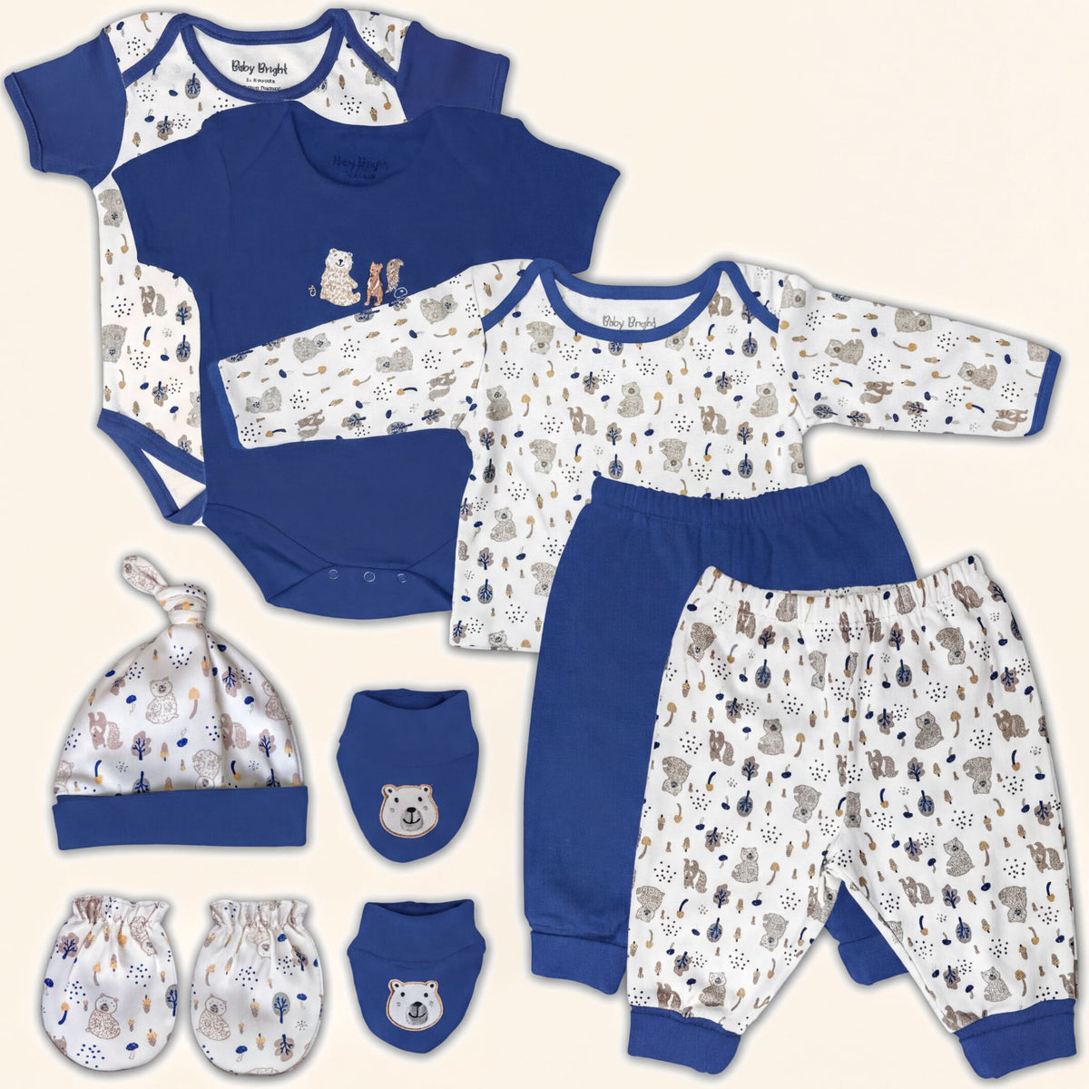 A collection of baby clothing and accessories, including a blue onesie, blue pants, a blue hat, and baby mittens, all featuring a pattern of animals and bears.