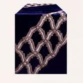 Embroidered decorative table runner with intricate floral patterns, designed for elegant home dining and special occasions.