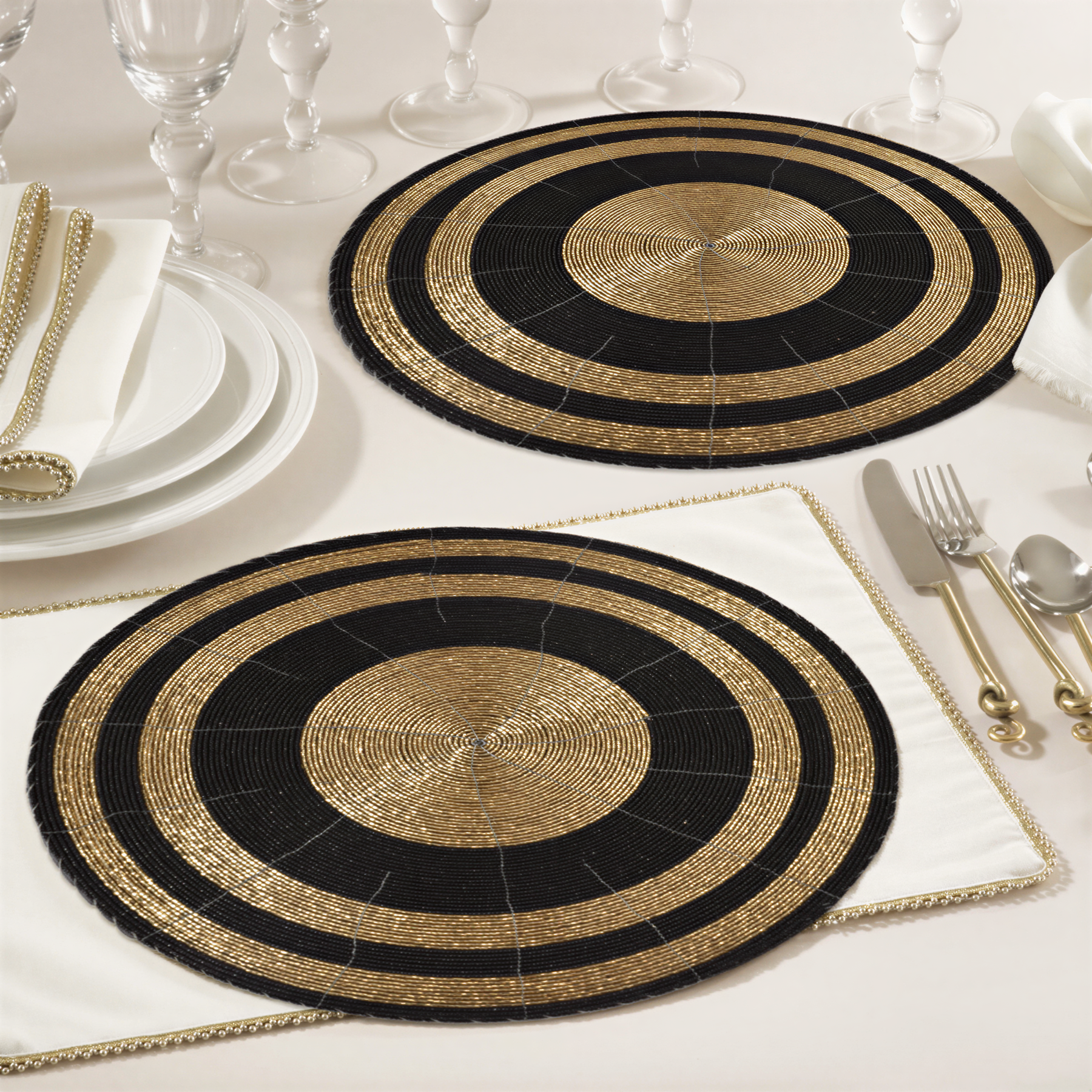 Set of four BD 023 014 The Aidan beaded placemats featuring intricate beaded design for elegant table setting.