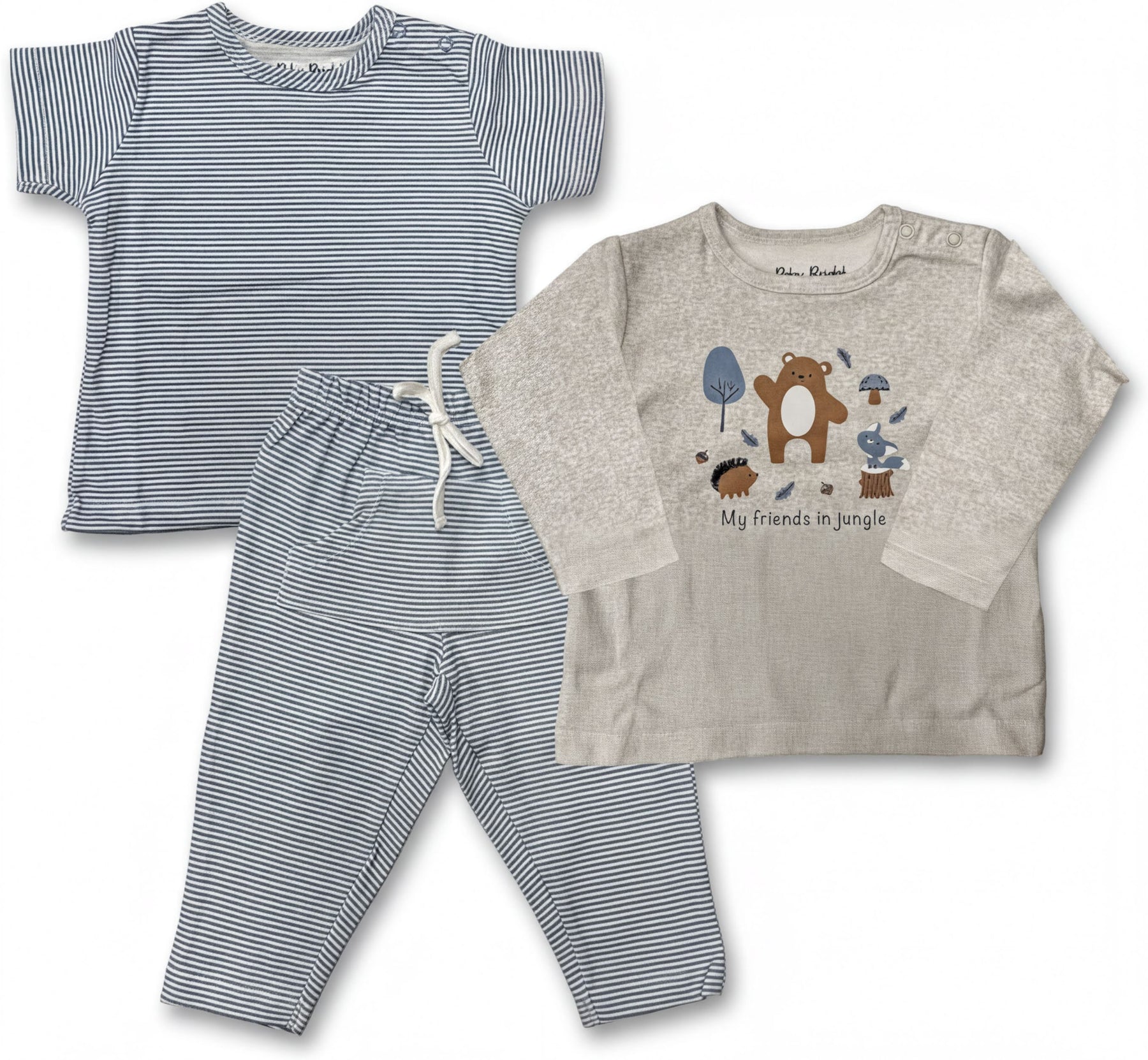 A striped shirt, a pair of striped pants, and a long-sleeved shirt with a jungle-themed design.