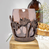 Elegant Aura stylish bathroom tumbler, contemporary decorative bath décor accessory with sleek design and modern home accent.
