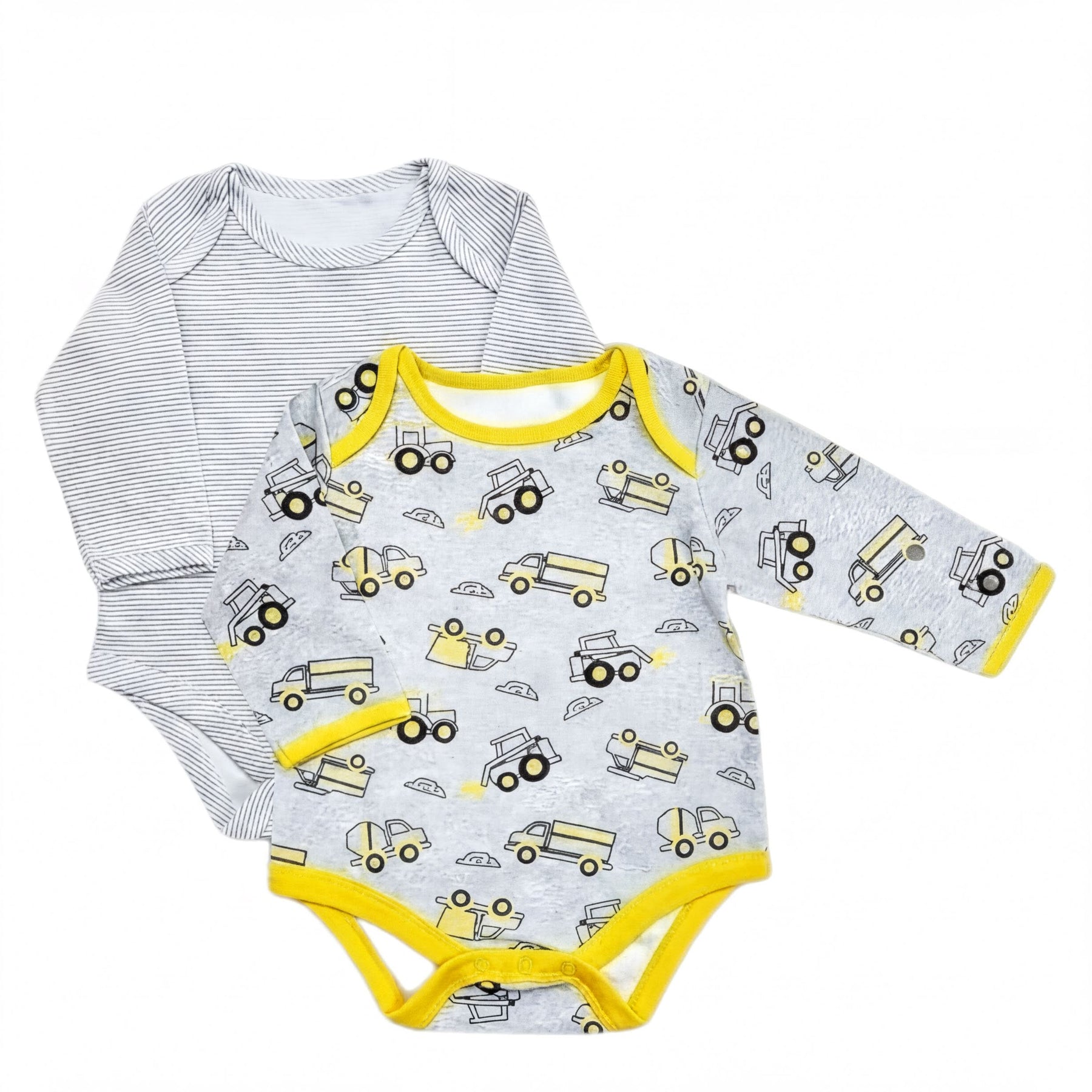 two baby onesies, one with a gray and yellow truck pattern and the other with a striped pattern.