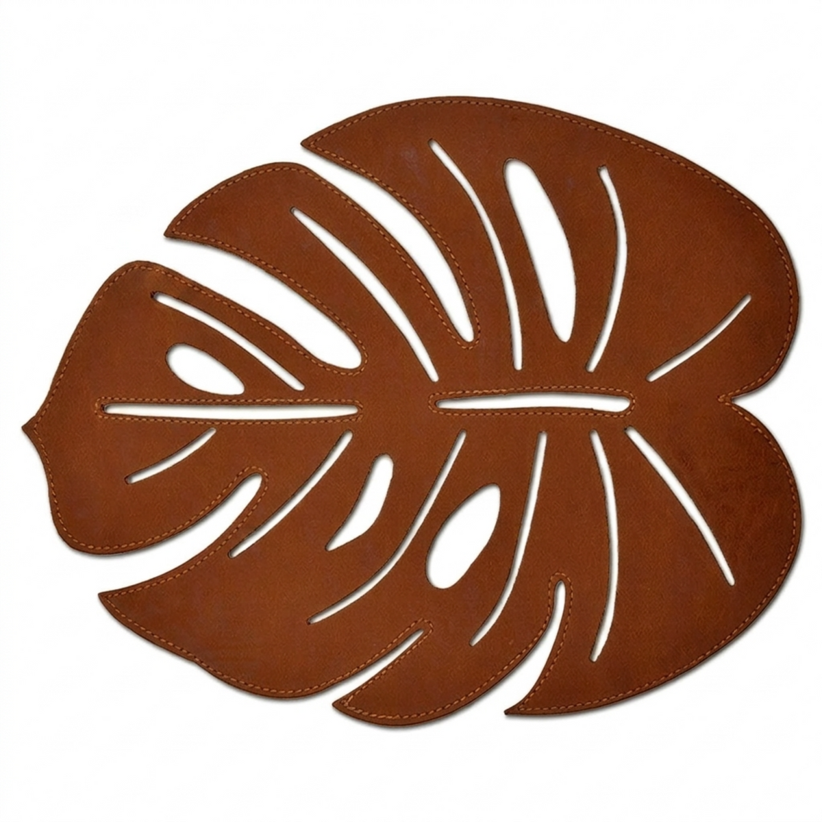 Set of six Monstera leaf cut out leather placemats in brown, showcasing detailed tropical leaf design for stylish table setting.