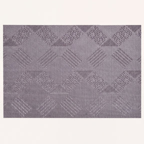 Set of four PVC placemats for dining table by 81702, durable and stylish protective table mats for everyday use.
