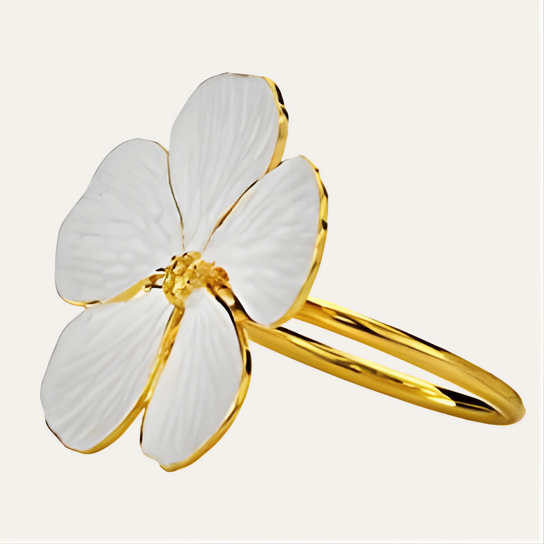 Set of four ZWZ-19-298 floral gold and white flower design napkin rings for elegant dining table décor.