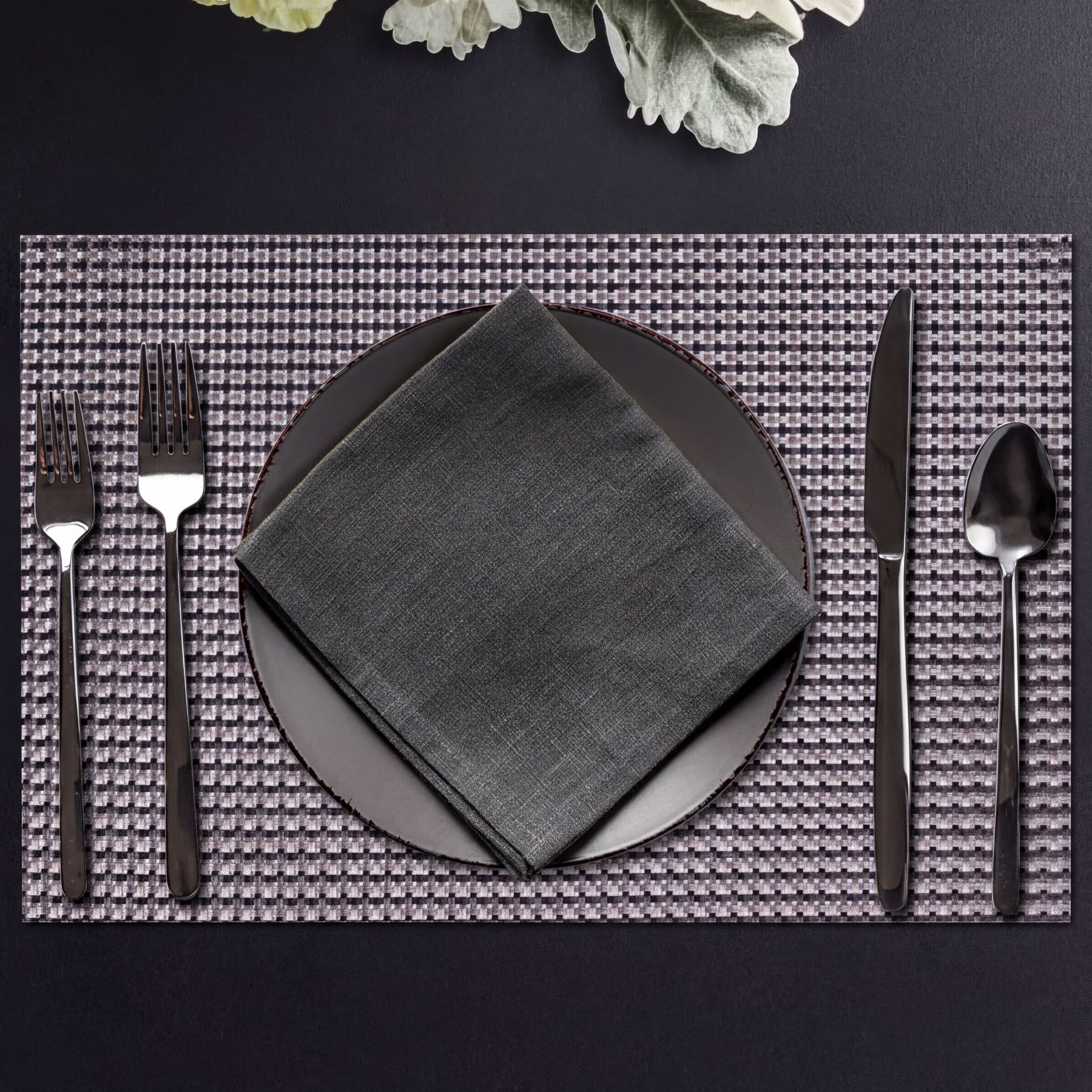 Set of four PVC placemats for dining tables, durable and stylish table protectors from brand 44334.