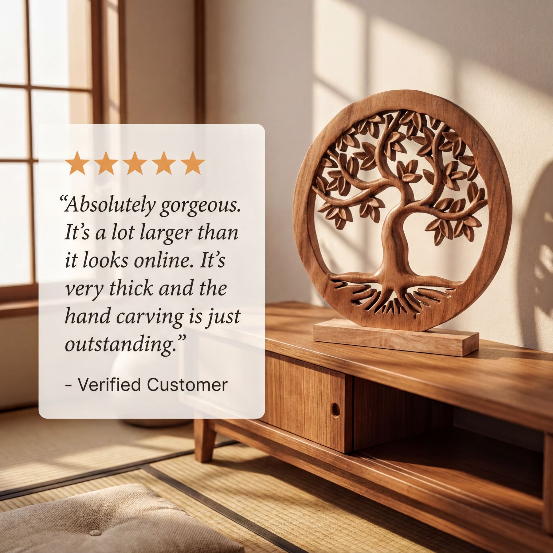 a wooden tree carving on a wooden stand, with a 5-star rating and a customer review stating that it is " Absolutely gorgeous. It's a lot larger than it looks online. It's very thick and the hand carving is just outstanding."