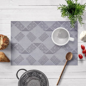 Set of four PVC placemats for dining table, durable and stylish PVC placemats by brand 81701, perfect for protecting surfaces.