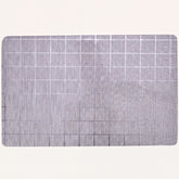 Set of 8 woven PVC placemats with a textured design, ideal for protecting tables and adding style to dining setups.