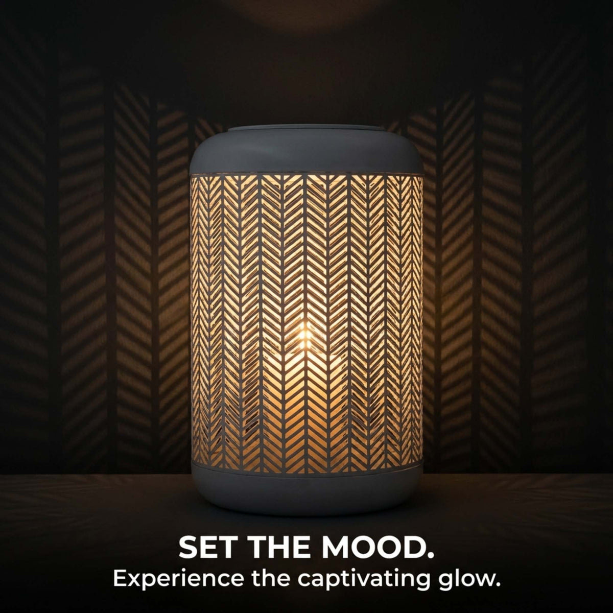 White lattice pattern glass candle lantern with metal frame, ideal for decorative lighting and ambient decor.