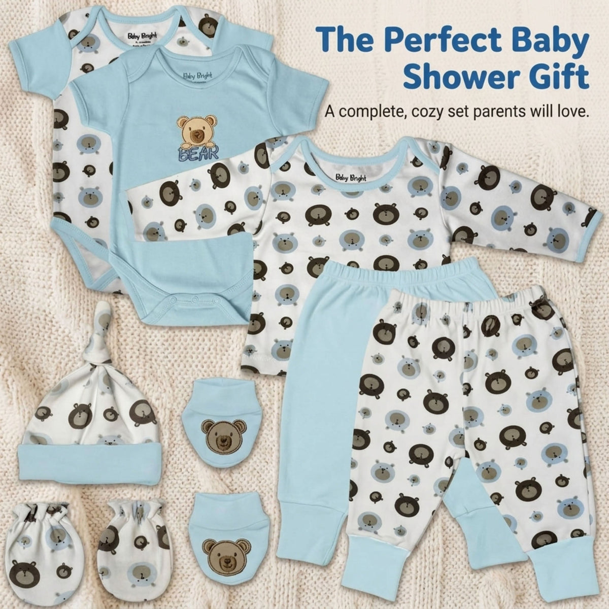 A collection of baby clothing and accessories, including onesies, pajamas, hats, and booties, arranged on a white background.