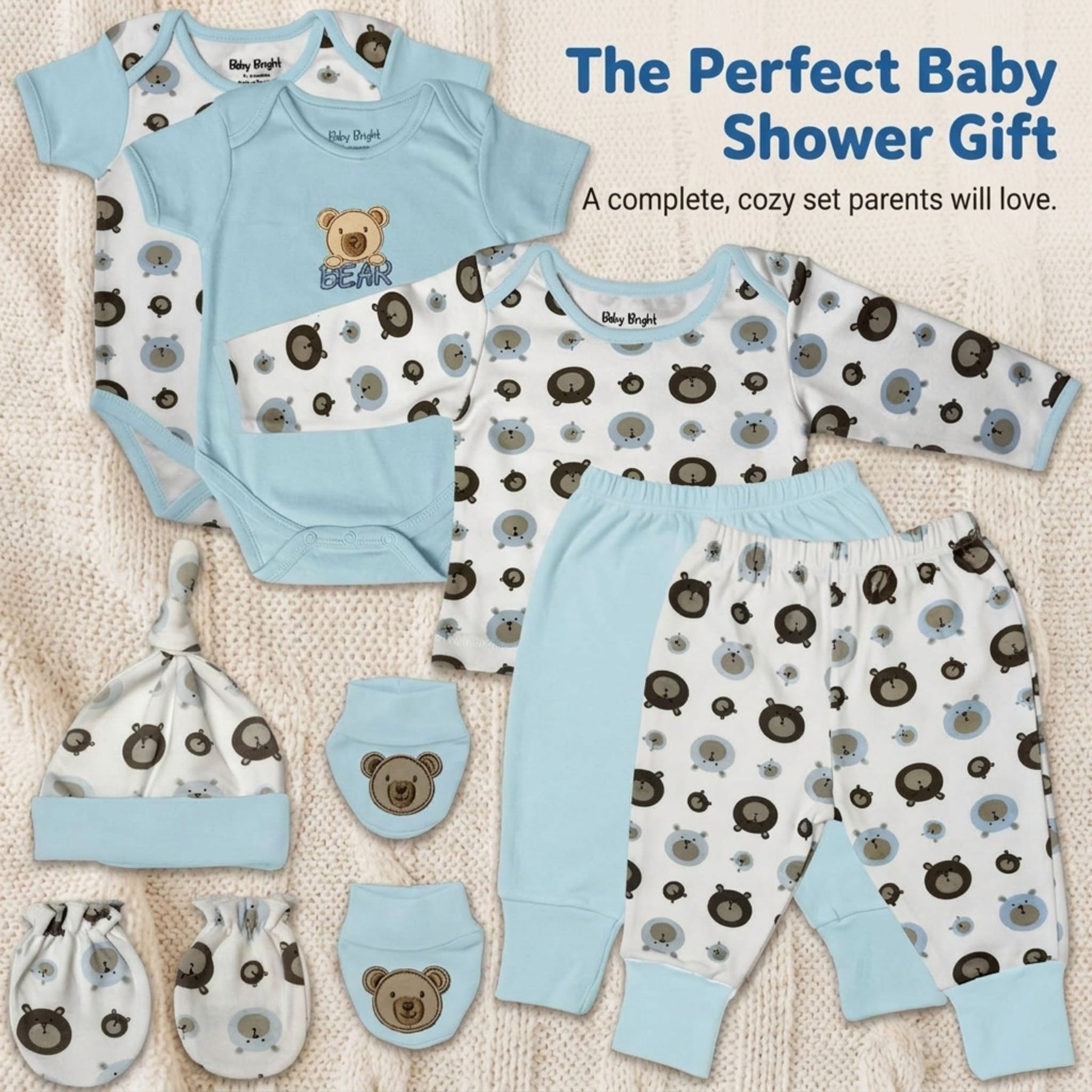 A collection of baby clothing and accessories, including onesies, pajamas, hats, and booties, arranged on a white background.