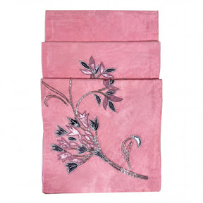 Embroidered decorative table runner by CU6409-RNR, featuring intricate needlework and elegant design for dining or decor.