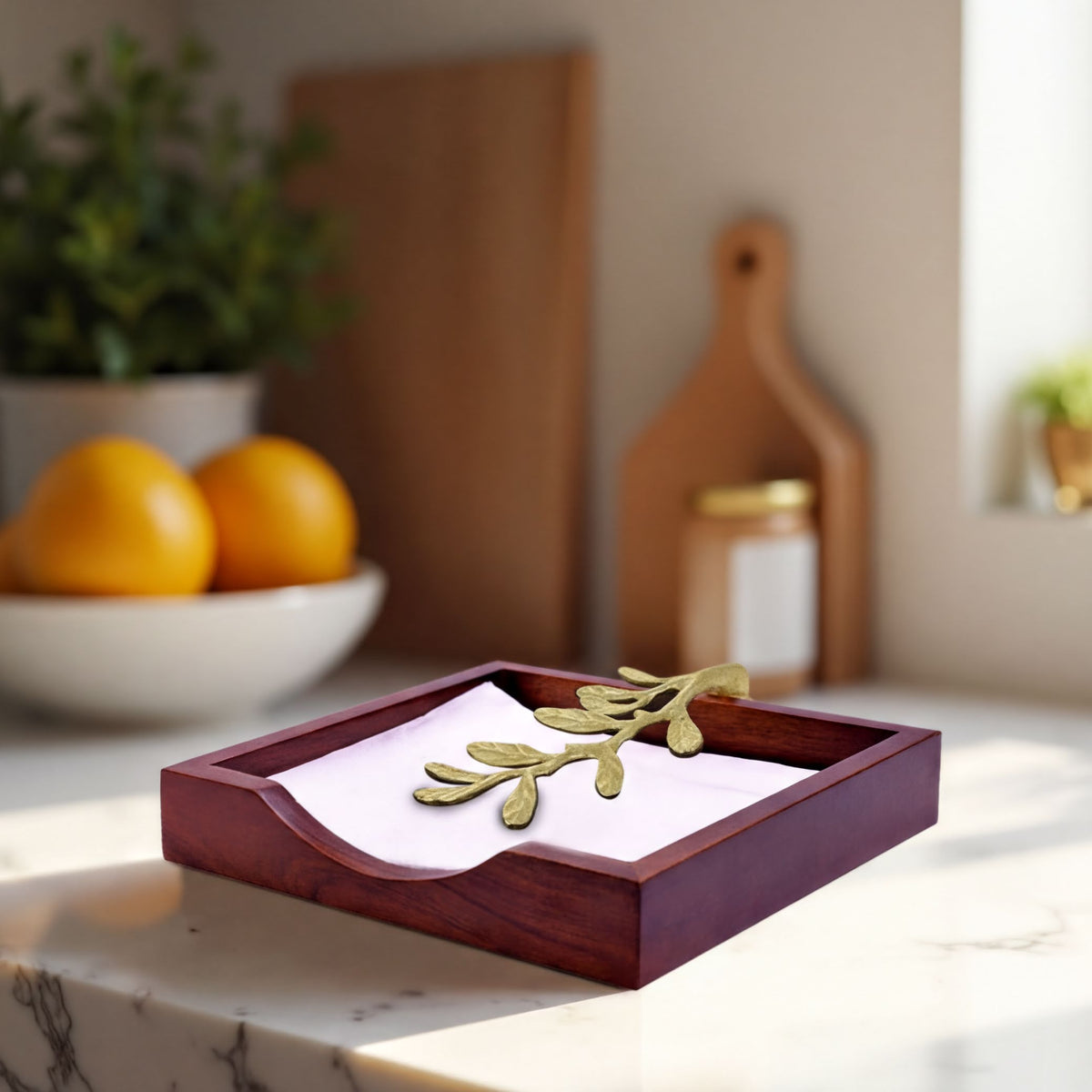 Solid wood napkin holder with gold finish ornament, elegant napkin dispenser for dining or kitchen decor.