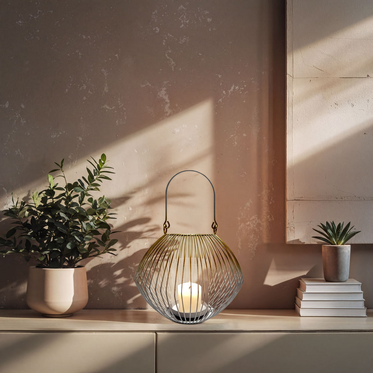 White and gold candle holder lantern from CA9942-MB, decorative metal lantern perfect for ambient lighting and home decor.