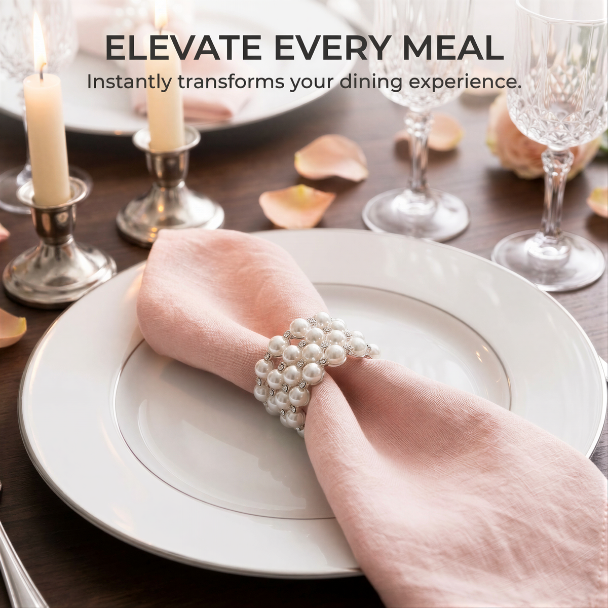 a table setting with a white plate, a pink napkin ring with pearls, and two wine glasses.