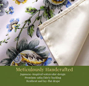 a close-up view of a handcrafted fabric with a Japanese-inspired watercolor design. The fabric has a premium satin backing and a resilient and flat drape, which are described as Meticulously Handcrafted.