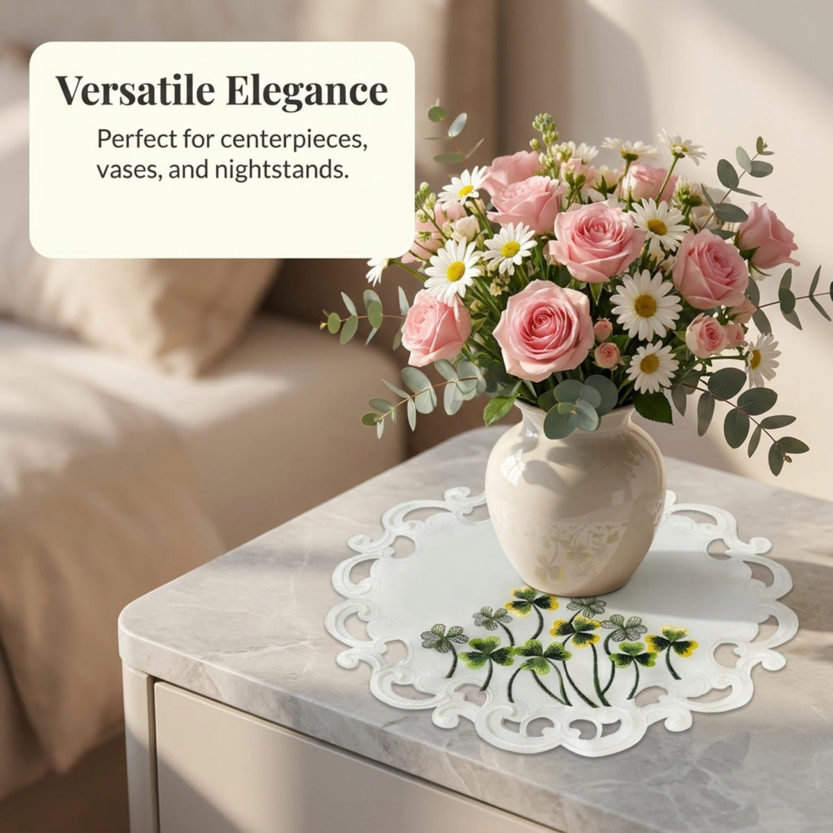 a bouquet of pink roses and white daisies arranged in a white vase, placed on a white doily with a floral design. The background is blurred, suggesting a bedroom setting.